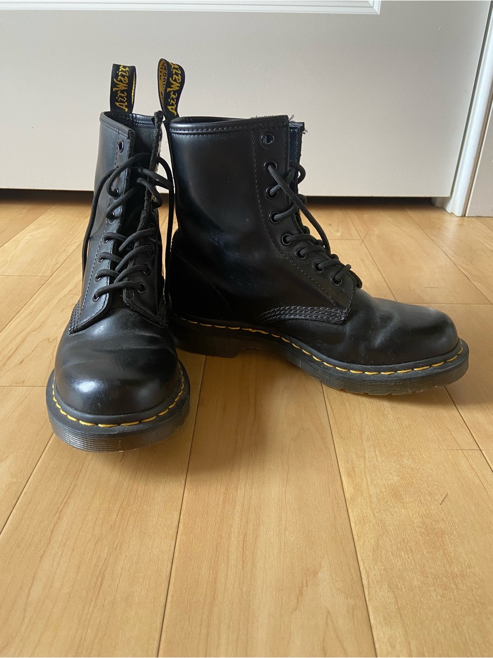 Dr. Martens Black Leather 8-Eye Lace-Up Boots with Yellow Stitching